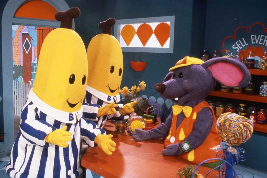 Live-action characters the Bananas in Pyjamas in Rat-in-a-Hat's Cafe.