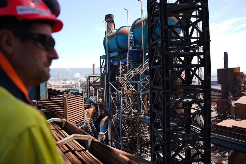 Steelworks with man in the foreground