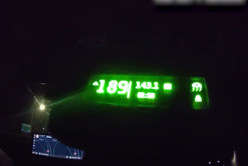 The numbers 189 visible on a small screen.