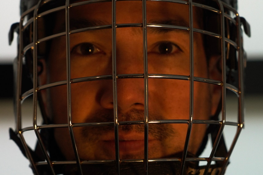 Man in hockey helmet