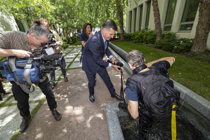 Martin Ollman tripped and fell backwards into a water feature while chasing Angus Taylor.