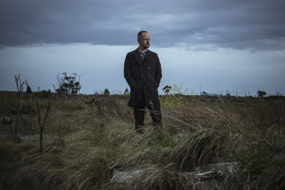 Melton councillor, Phillip Zada, pictured in Mt Atkinson’s undeveloped town centre, says the community deserves a distinct identity.