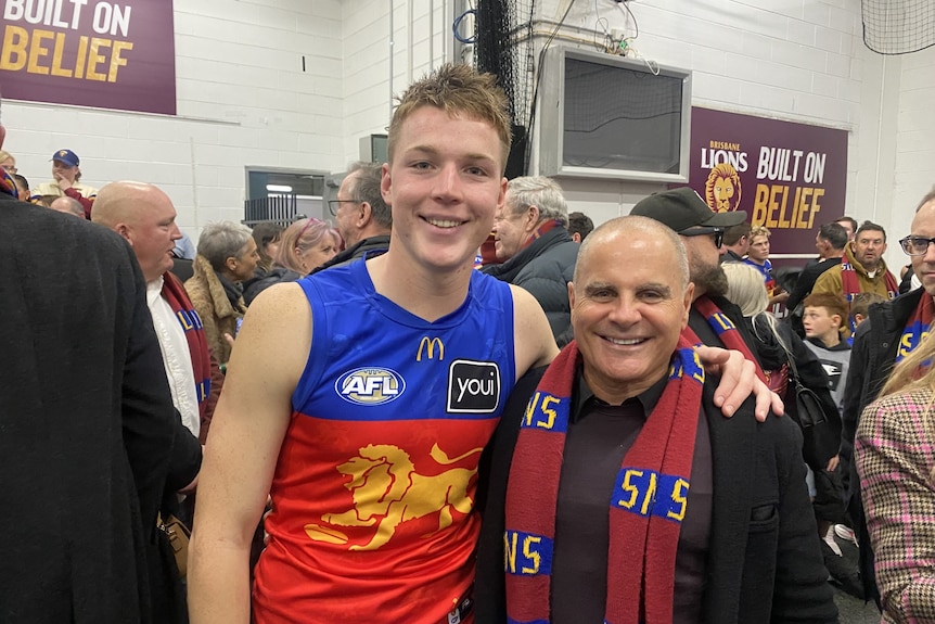 Jamie Pherous with Lions