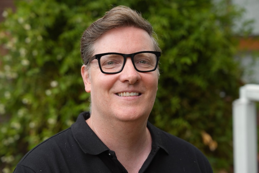 Clarke Towson smiles at the camera.