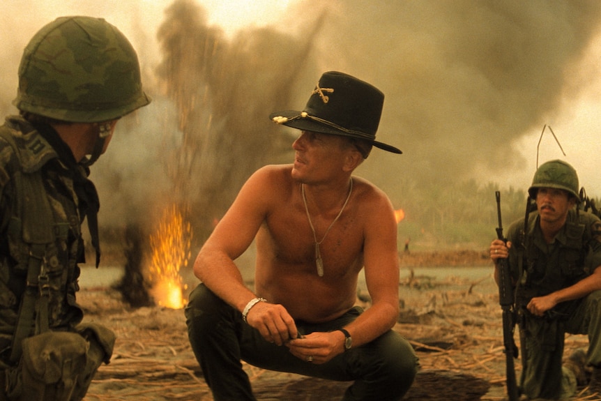 A shirtless Robert Duvall in the film Apocalypse Now.
