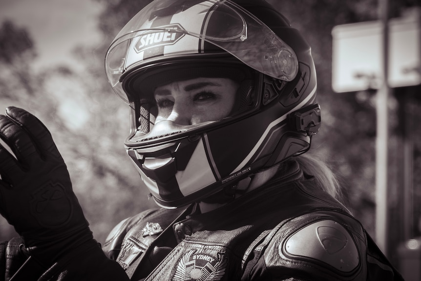 Woman puts on gloves