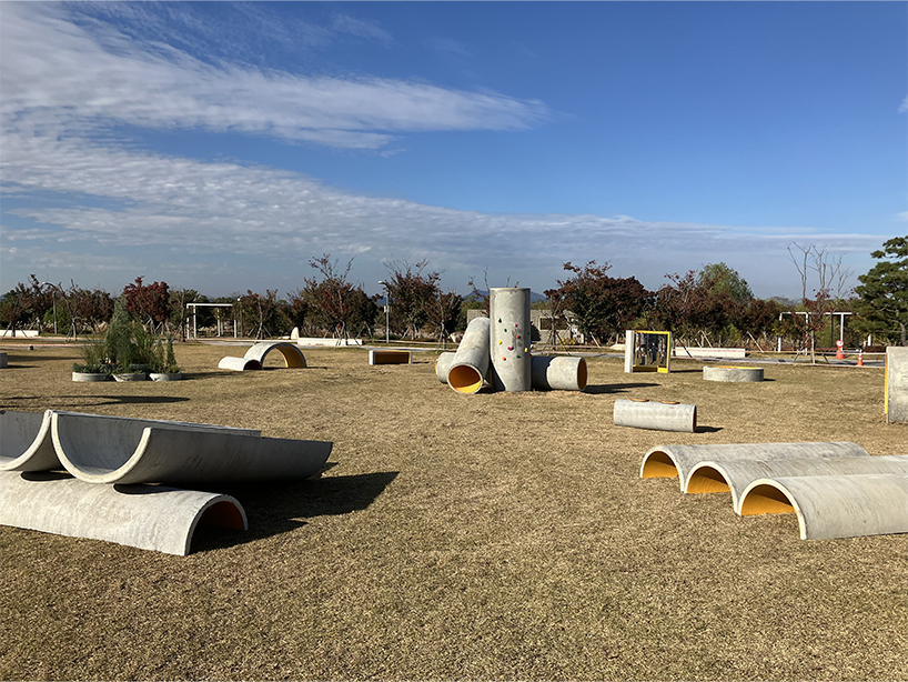 concrete utopia transforms discarded construction pipes into playground in south korea