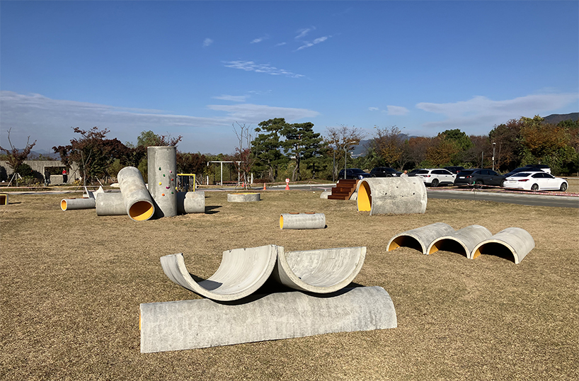 concrete utopia transforms discarded construction pipes into playground in south korea