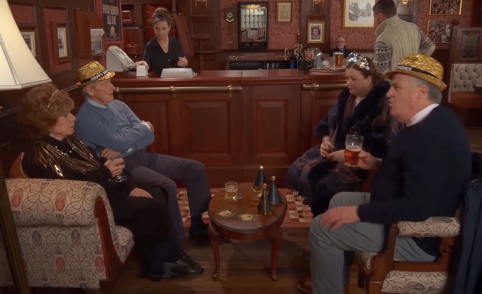 Coronation Street, Rita Ken Mary and Brian in the Rovers coronation street, rita ken mary and brian in the rovers, sat around a table and wearing sparkly hats and tiaras