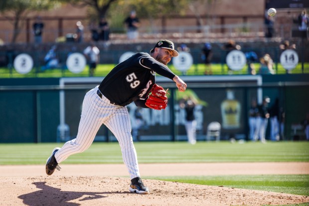 Chicago White Sox pitcher Sean Burke (59) pitches during the fourth inning of a Cactus League game against the Milwaukee Brewers at Camelback Ranch on Sunday, Feb. 22, 2026, in Glendale, Ariz. (Armando L. Sanchez/Chicago Tribune)