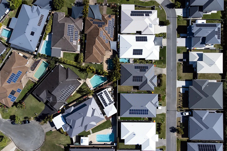 Top down view of typical city-fringe suburb of Coomera Waters, Gold Coast, Australia