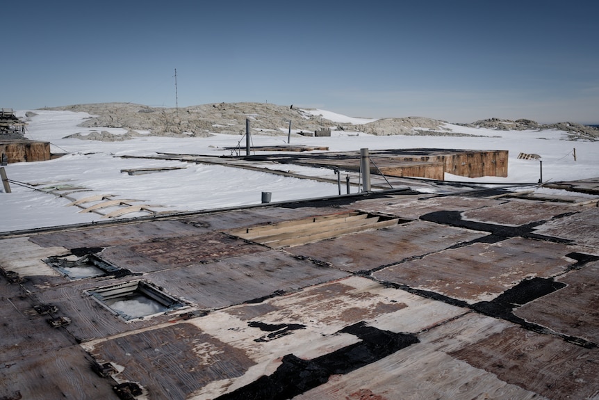 The tops of roofs in the snow.