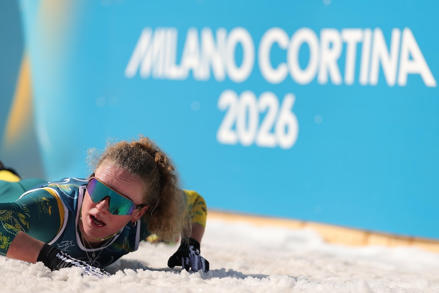 Rosie Fordham lies in the snow