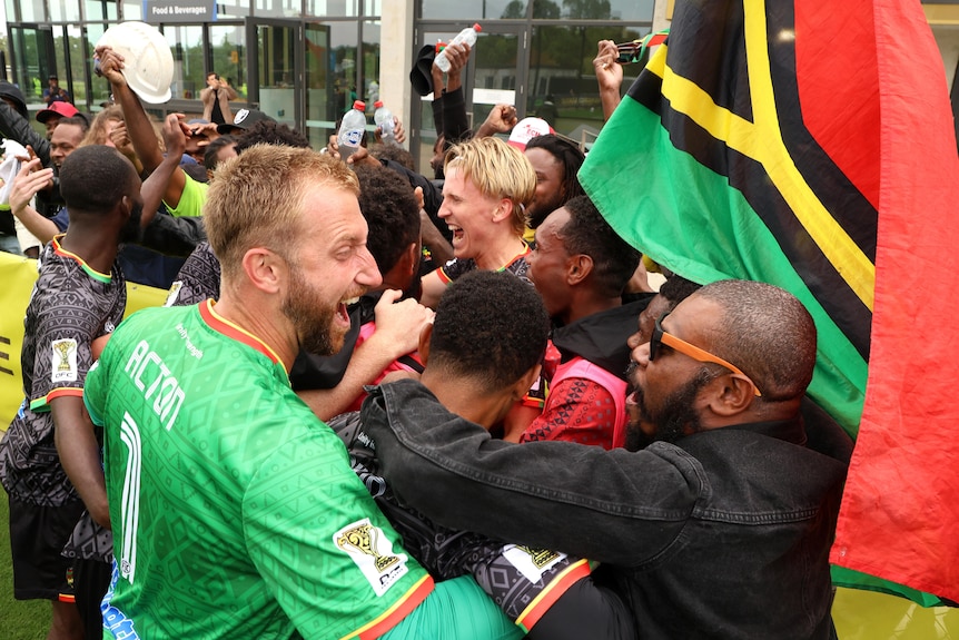 Matt Acton celebrates with fans