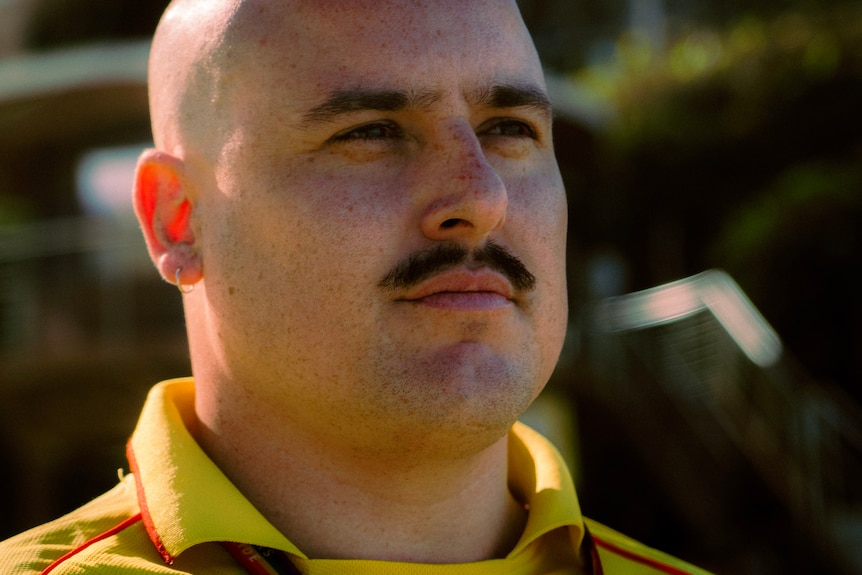 Lifesaver looking at the shore.