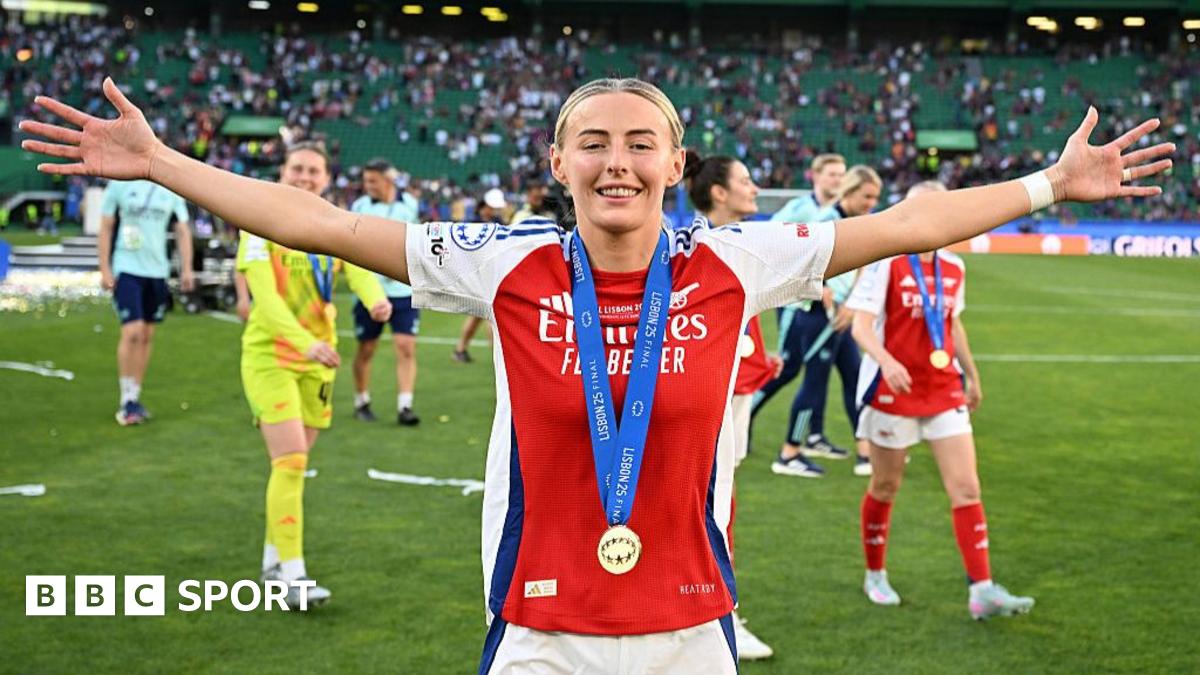 Arsenal's players celebrate lifting the Women's Champions League trophy