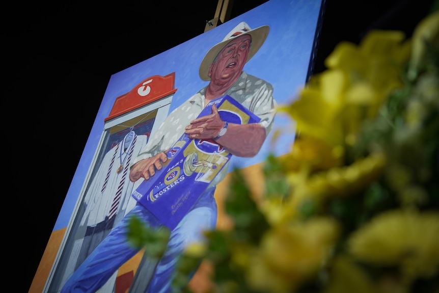 Portait painting of a white man, wide-brim country hat, tapping carboard box, telstra phone box behind him country background