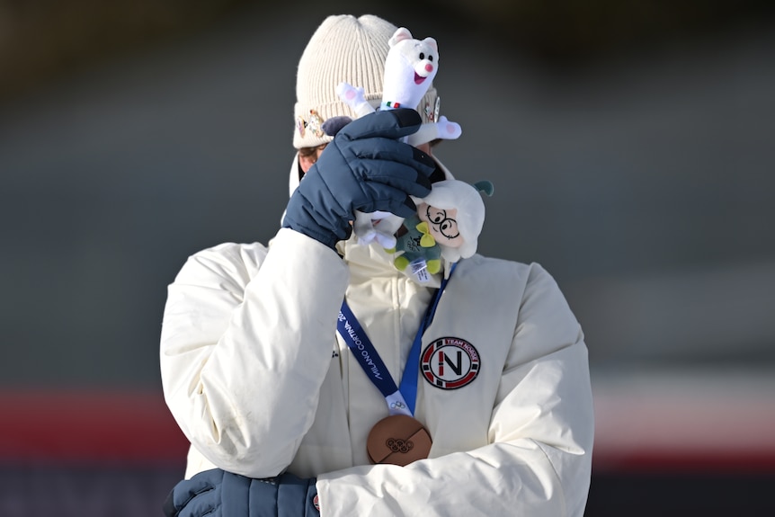 Sturta Holm Laegreid covers his face