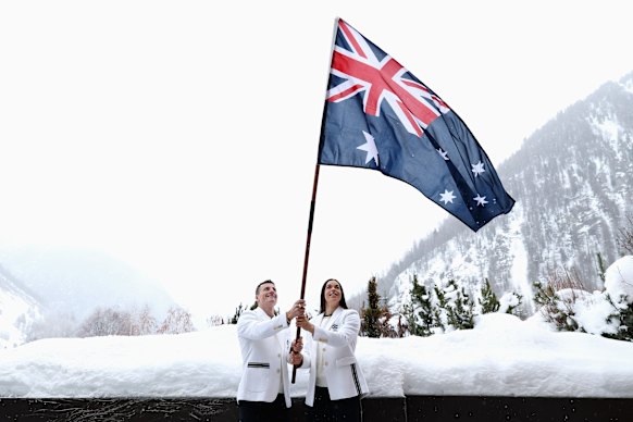 Australia flag bearers Jakara Anthony and Matt Graham.