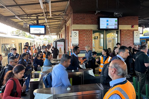 There was a two-way rush for the myki gates at Caulfield station, causing some city-bound travellers to miss a train. 