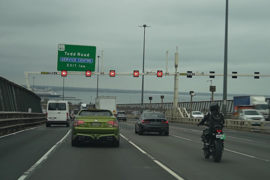 Cars drive inbound on the West Gate Bridge.