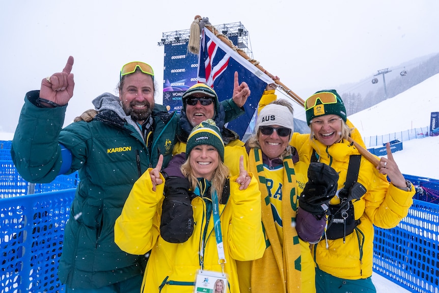 Peter McNiel with Alisa Camplin-Warner and other coaches