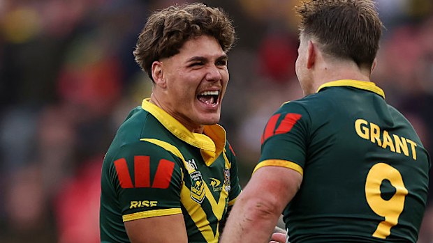 Reece Walsh and Harry Grant of Australia celebrate after winning game one.