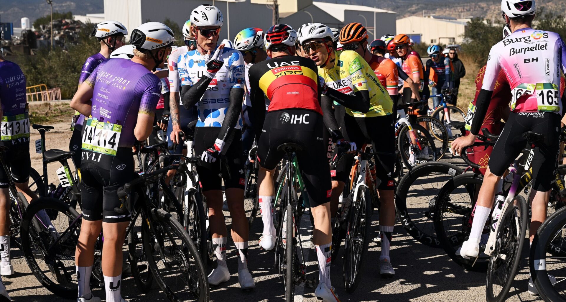 Riders blown off the road as high speed winds disrupt stage racing across Spain