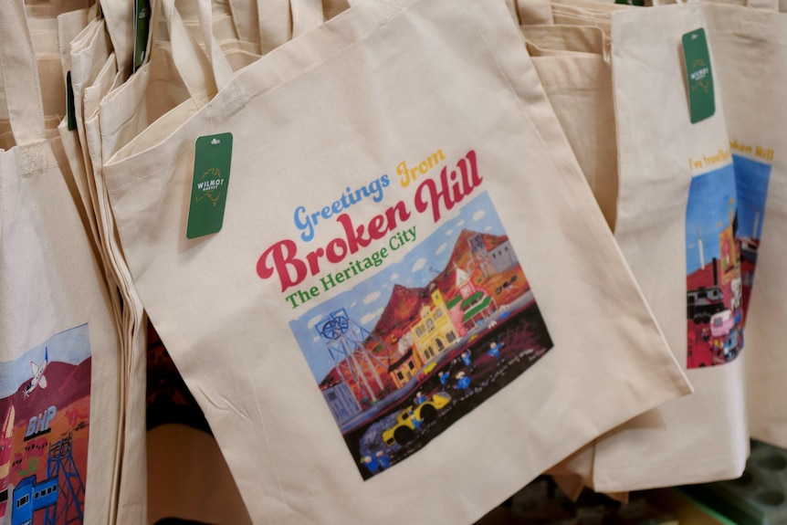 a white tote bag that reads Broken Hill