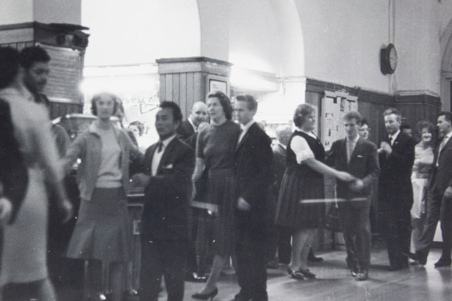 A black and white photo of a Saturday night dance 