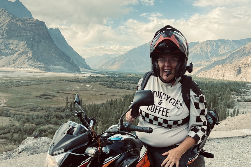 Liza Miller on a motorbike. 