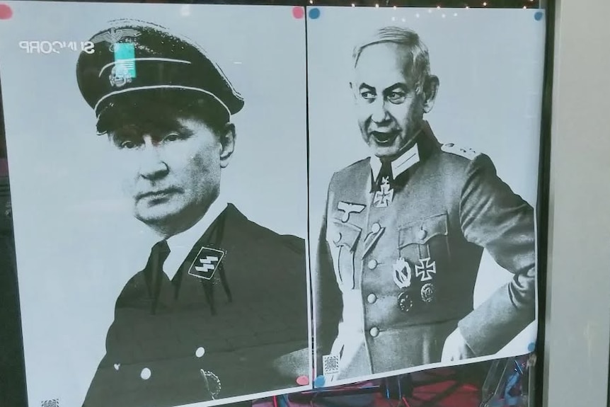 Posters of Benjamin Netanyahu and Vladimir Putin dressed in Nazi uniforms on display in the window of a bar in Canberra.