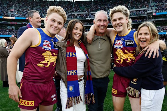 Family affair: Levi (left) and Will Ashcroft with sister Lucy, dad Marcus and mum Bekky after the Lions’ 2025 grand final win.
