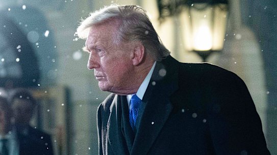 President Donald Trump speaks to reporters as he walks in the South Lawn before departing the White House, Friday,