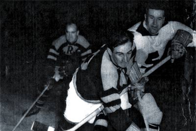 Geoff Henke playing hockey