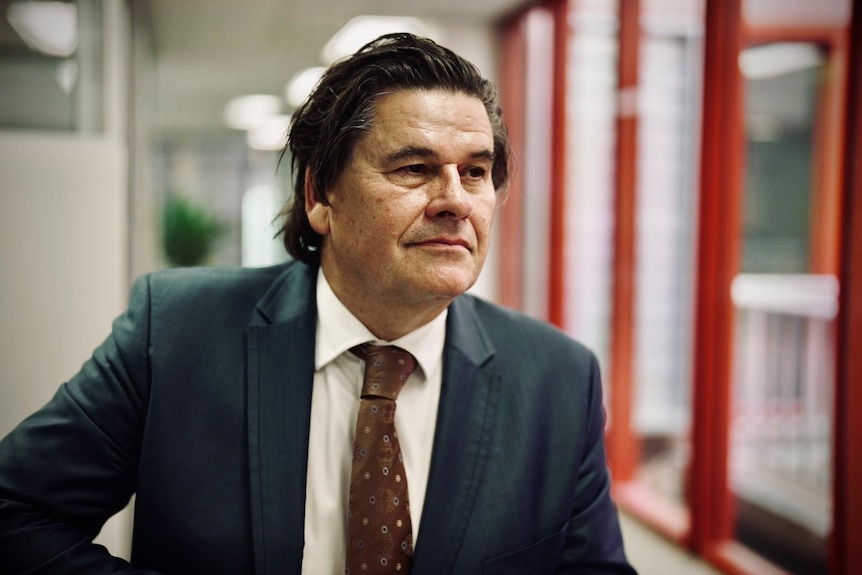 A man in a suit and tie.