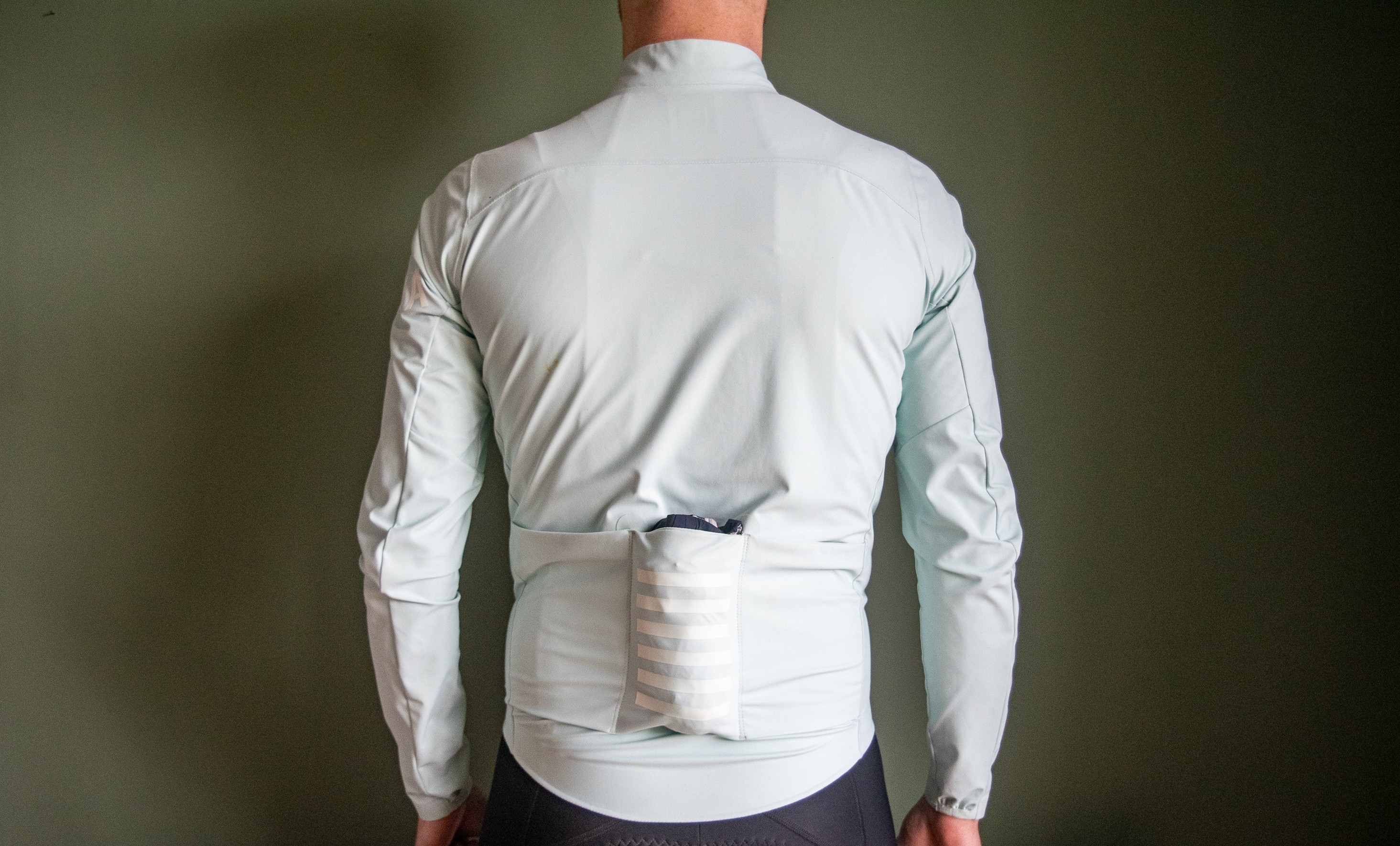 A man wearing a Rapha shadow jersey