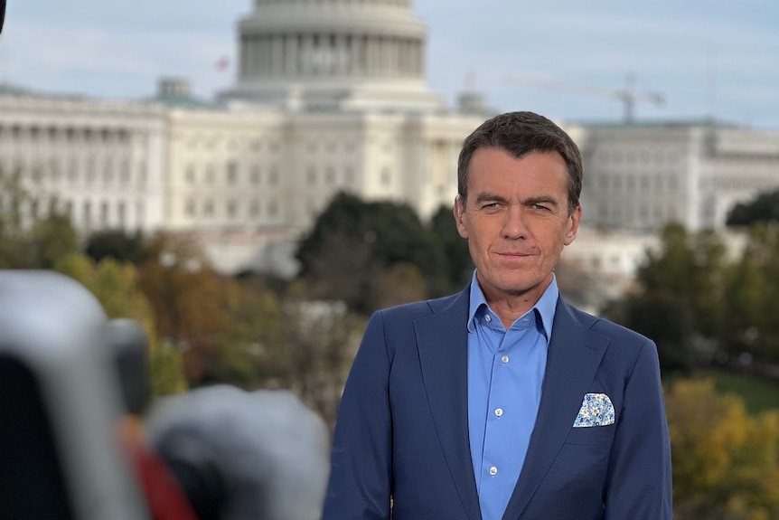 Michael Rowland stands in front of the Capitol Building in Washington DC