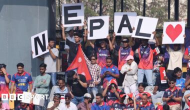 Nepal supporters with banners during England match