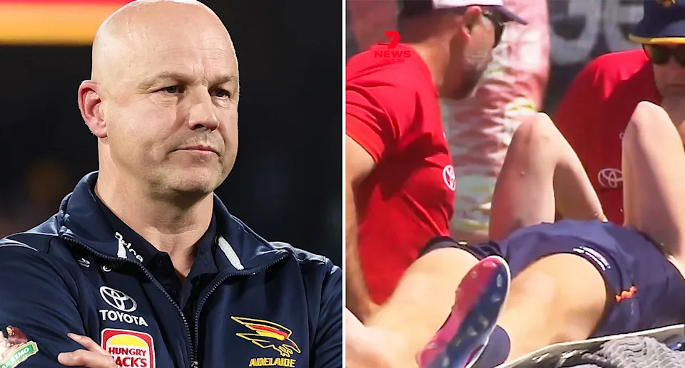 On the left is Adelaide coach Matthew Nicks and Crows defender Mark Keane on right.