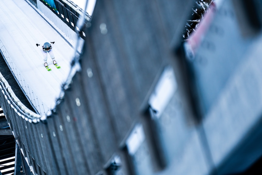 Gyda Westvold Hansen slides down the inrun