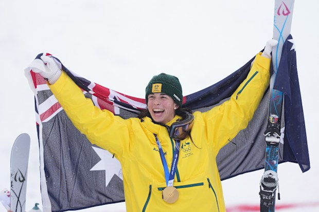 Gold medallist Jakara Anthony celebrates after the women's freestyle skiing dual moguls finals at the 2026 Winter Olympics, in Livigno, Italy, Saturday, Feb. 14, 2026. (AP Photo/Lindsey Wasson)