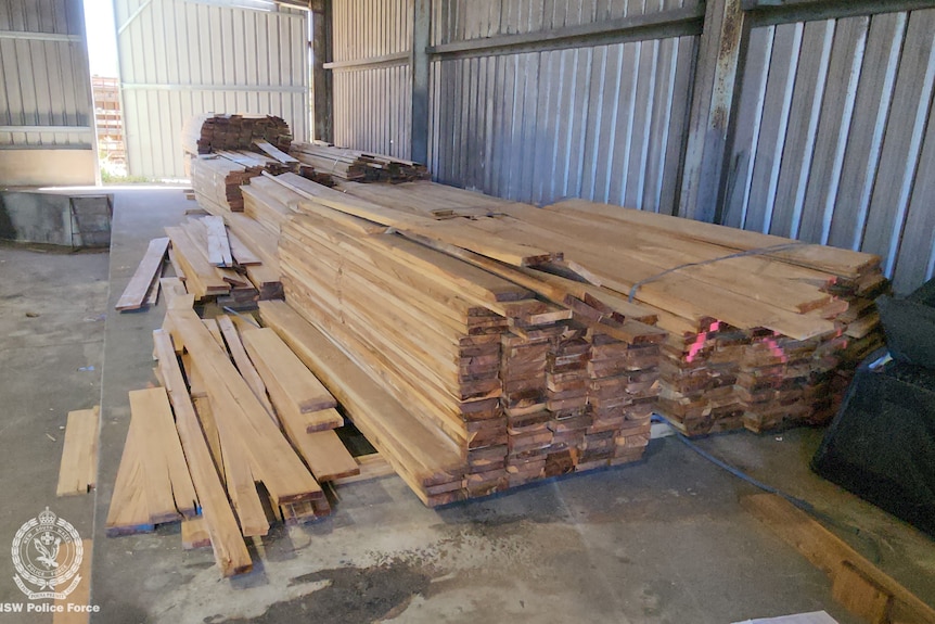 Planks of wood in a shed.