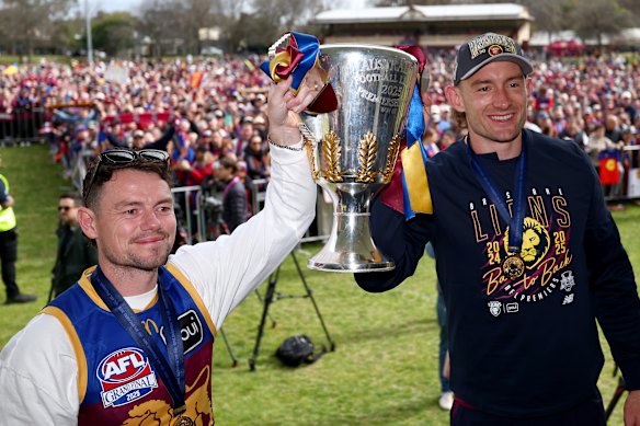 Lachie Neale and Harris Andrews with last year’s premiership cup.