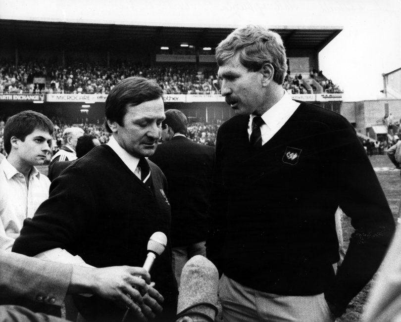 Rival coaches Kevin Sheedy and Ron Alexander after the match.