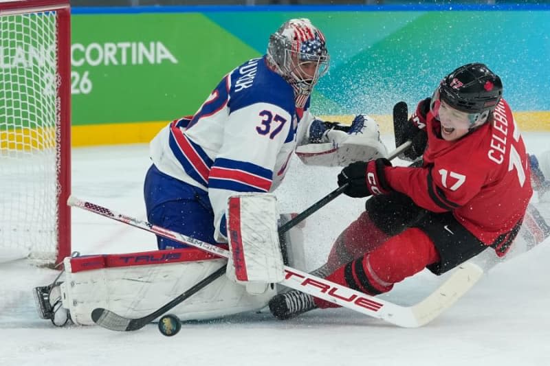 United States’ Connor Hellebuyck (37) stops a shot attempt by Canada’s Macklin Celebrini (17) during the third period of the men’s hockey gold medal game between Canada and the United States at the 2026 Winter Olympics, in Milan, Italy, Sunday, Feb. 22, 2026. | Petr David Josek, Associated Press.