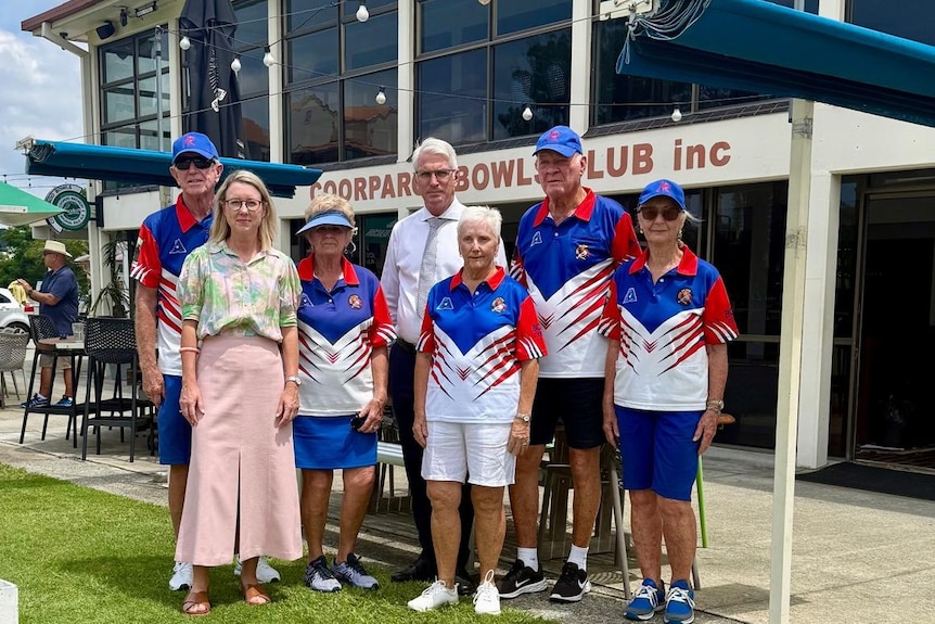 A group photo at a bowls green