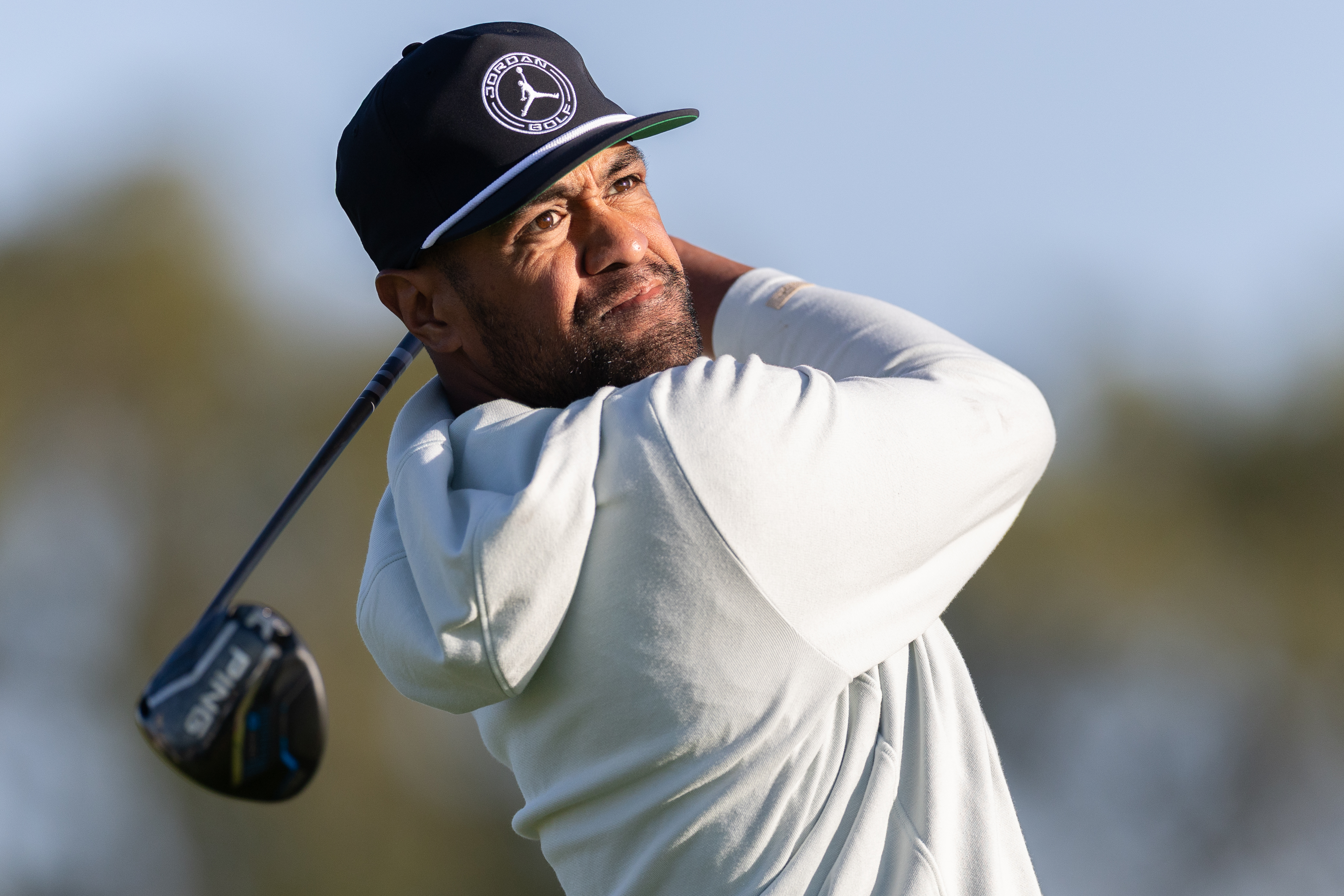 Tony Finau hits a driver off the tee