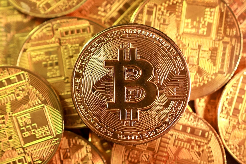A physical coin intended to represent bitcoin.