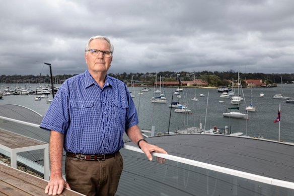 Naval Historical Society president David
Michael, pictured with Spectacle Island in the distance, believes the site’s heritage should be maintained.